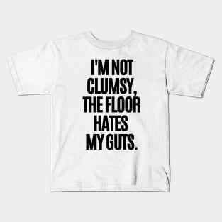 I'm not clumsy, the floor hates my guts. Kids T-Shirt